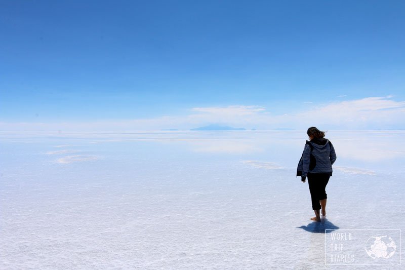 The mom in Uyuni Salt Flats. It was one of the greatest moments of the trip, no doubts! Click here to know more about Bolivia for families!