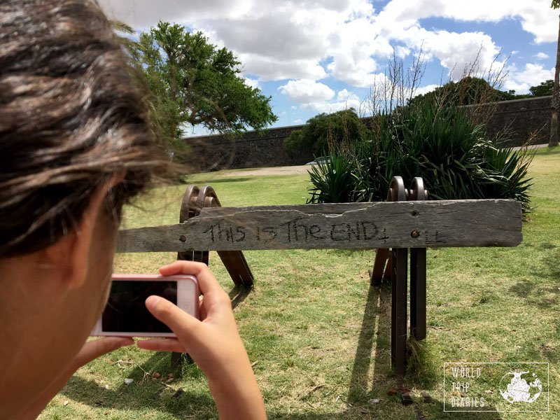 A wooden sign saying This is the End, in Colonia del Sacramento, Uruguay. Colonia is incredibly beautiful BUT it's tiny. A weekend getaway, for sure!