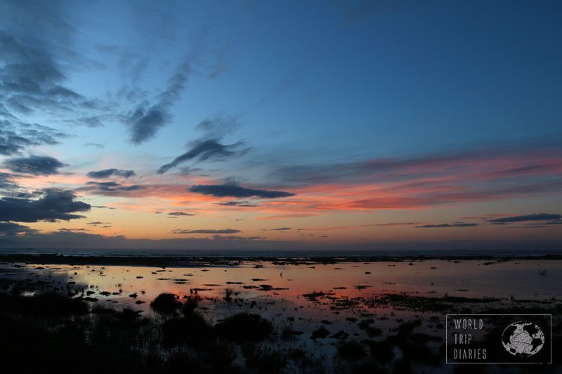 The sunset reflecting on the beach of Bluff, New Zealand. It's the place where the skies were unbelievably beautiful all day long!