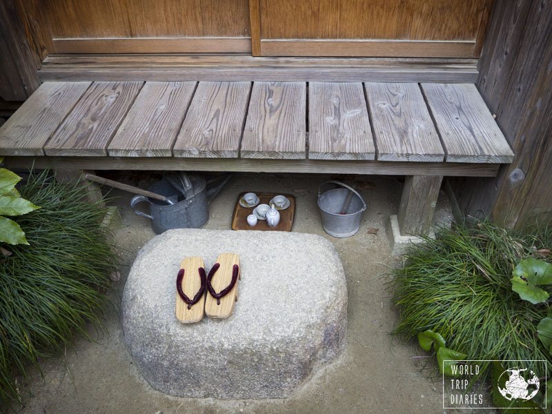 The outside deck with sandals on a rock and a tea set + gardening tools under the deck. It was a great day to also learn how the Japanese in the 80's lived. A visit to Satsuki and Mei's house is a must!