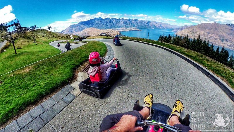 The Luge is one of the best family activities in Queenstown. In the photo, you can see C (6) and dad on the track.