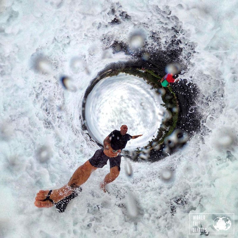 When the water blew through one of the smaller blow holes and caught us by surprise: Angelo surrounded by water and the kids running away from it