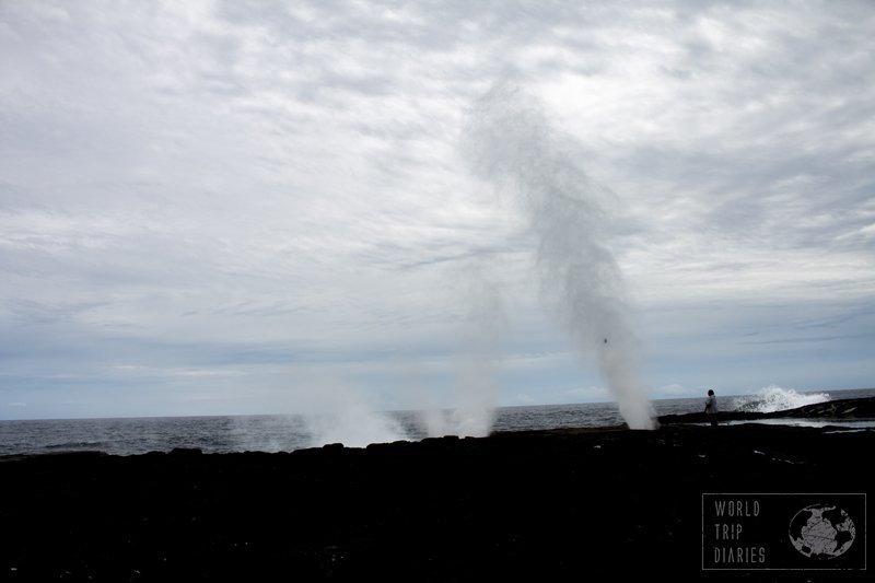 Alofaaga Blowhole, in Samoa, blowing water - the water was strong and it carried coconuts high up. It was one of the best things to do in Savaii for kids. 