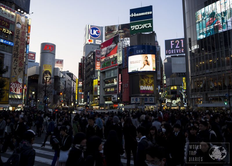 Shibuya crossing, full with people, and surrounded by buildings. That's Japan!